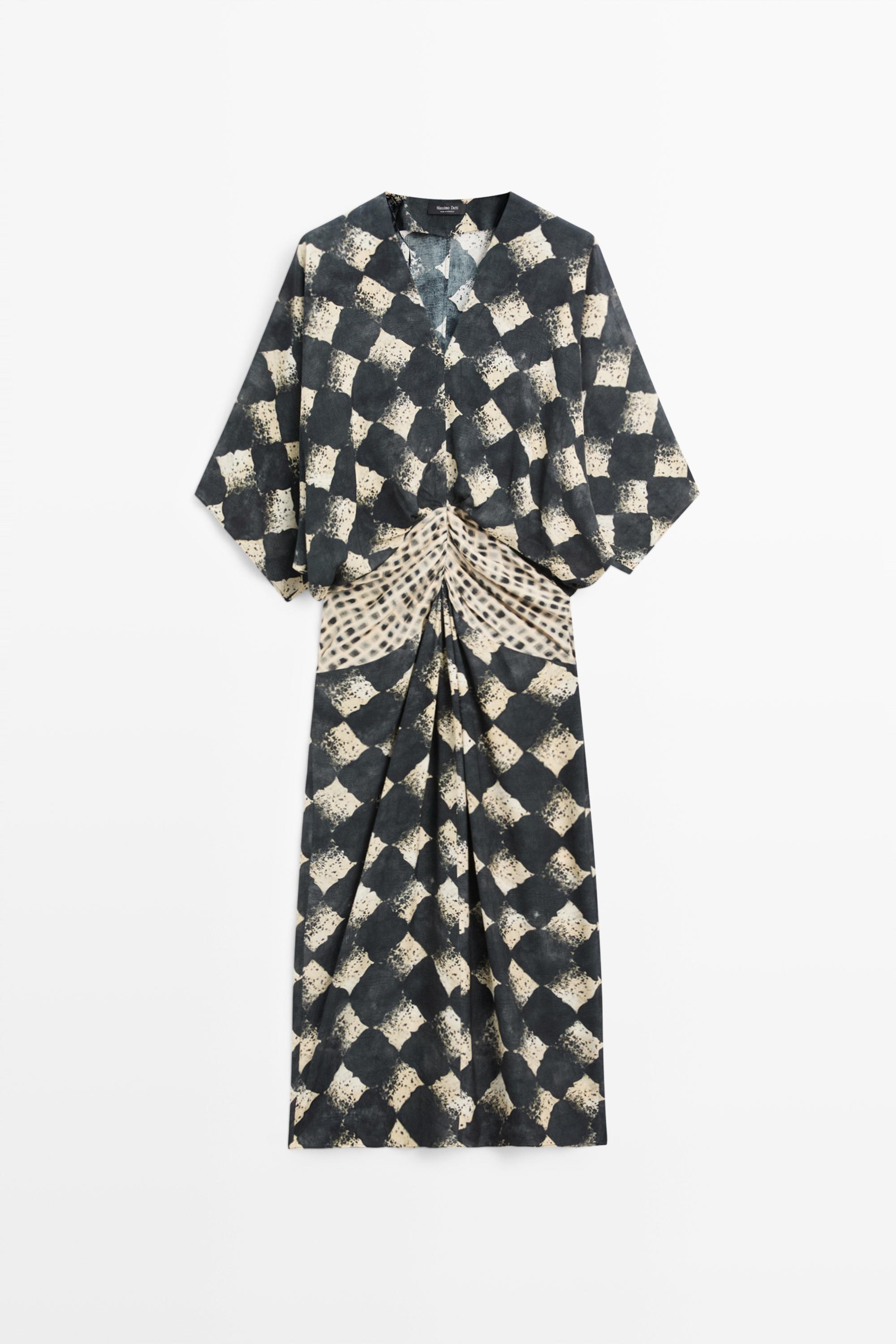 Flowing dress with sash belt detail